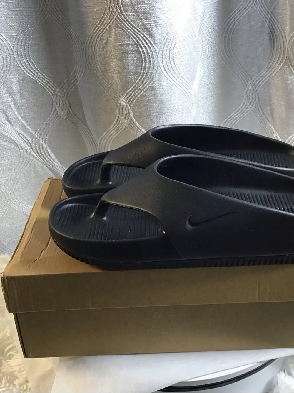 Nike Black Men’s Slip-On Foam Flip Flops